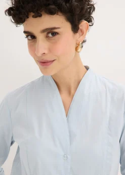 Mujer bonprix bonprix Blusa elástica de popelín con cuello chimenea y ligera transparencia