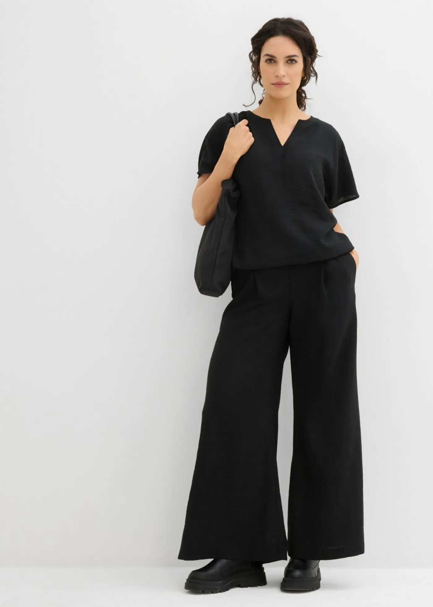 bonprix bonprix Camisas Y Blusas>Blusa holgada con dobladillo elástico Negro