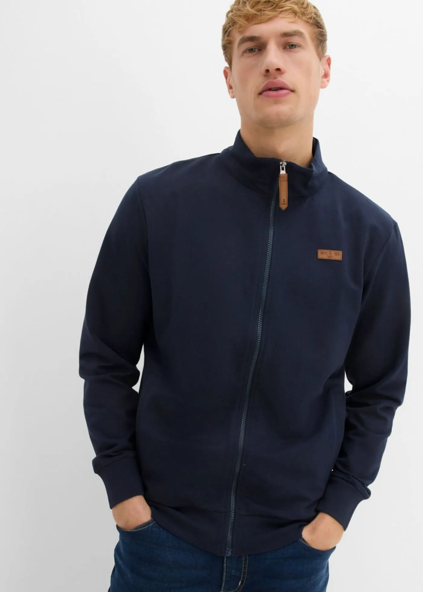 Hombre bonprix bonprix Chaqueta de chándal con cuello alto con detalles de piel sintética