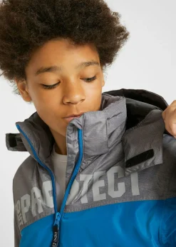 Niños bonprix bonprix Chaqueta impermeable de invierno con capucha y diseño en color block