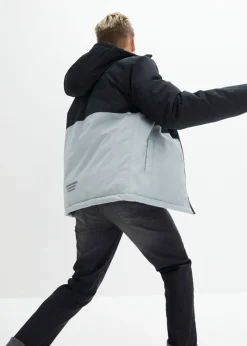Niños bonprix bonprix Chaqueta impermeable de invierno con capucha y diseño en color block