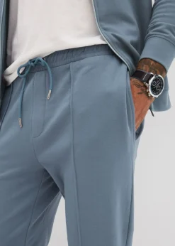 Hombre bonprix bonprix Elegante pantalón deportivo con ribete de suave mezcla de algodón