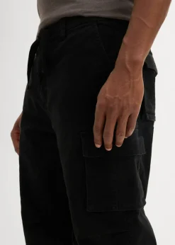 Hombre bonprix bonprix Pantalón capri elástico tipo cargo con corte holgado y ancho