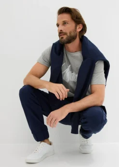 Hombre bonprix bonprix Pantalón de chándal con bolsillos tipo cargo y corte holgado