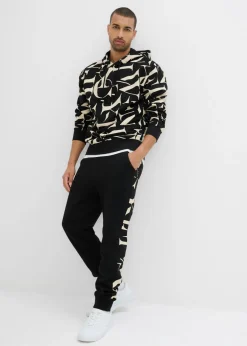 Hombre bonprix bonprix Pantalón de chándal de algodón orgánico puro con inserto