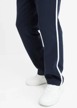 Hombre bonprix bonprix Pantalón de chándal loose fit con detalles en contraste (2 unidades)