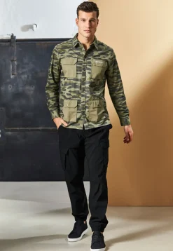 Hombre bonprix bonprix Pantalón elástico sin cierre con bolsillos tipo cargo y corte holgado