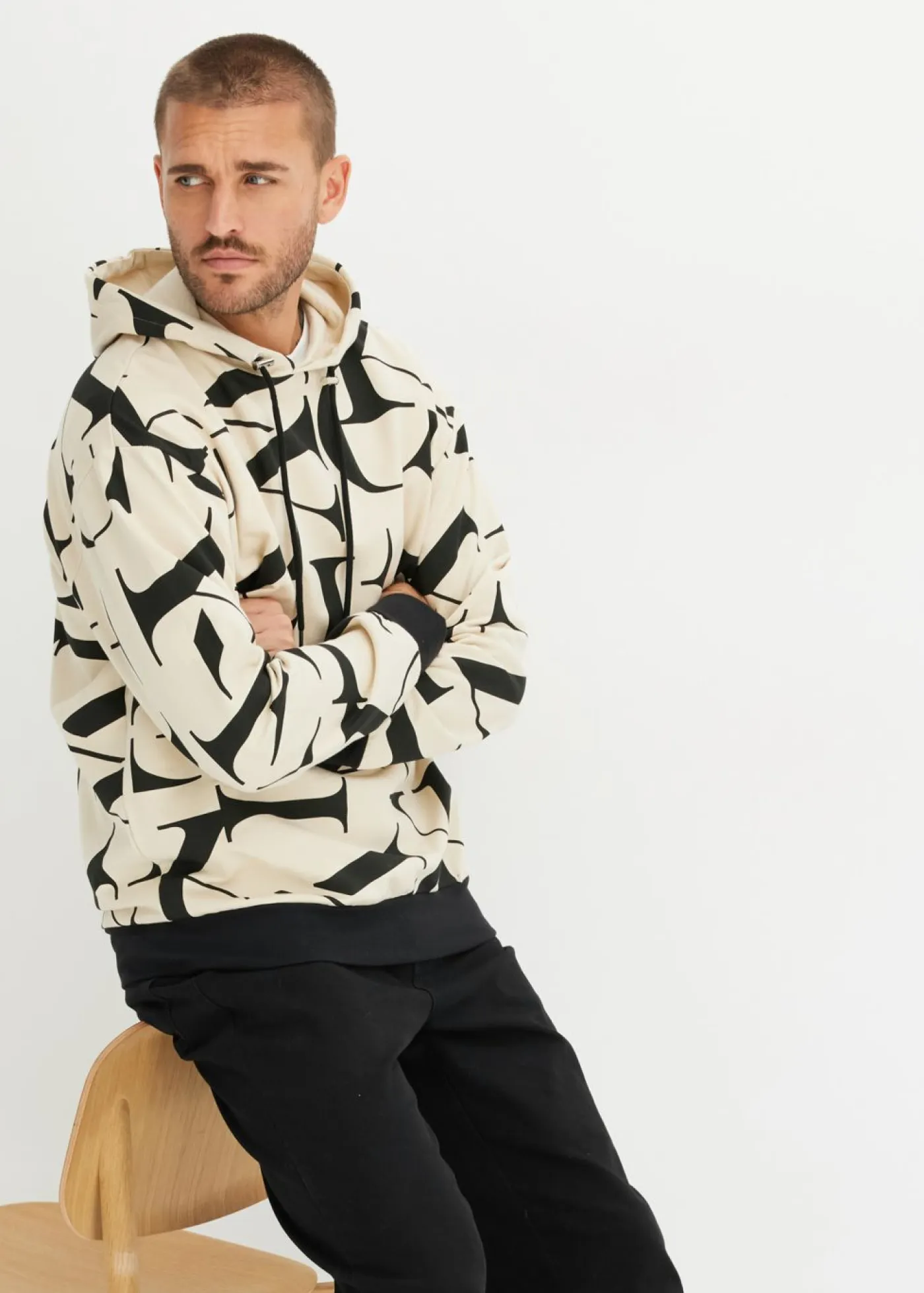 bonprix bonprix Chándals>Sudadera de algodón orgánico con corte holgado y capucha Arena claro-negro