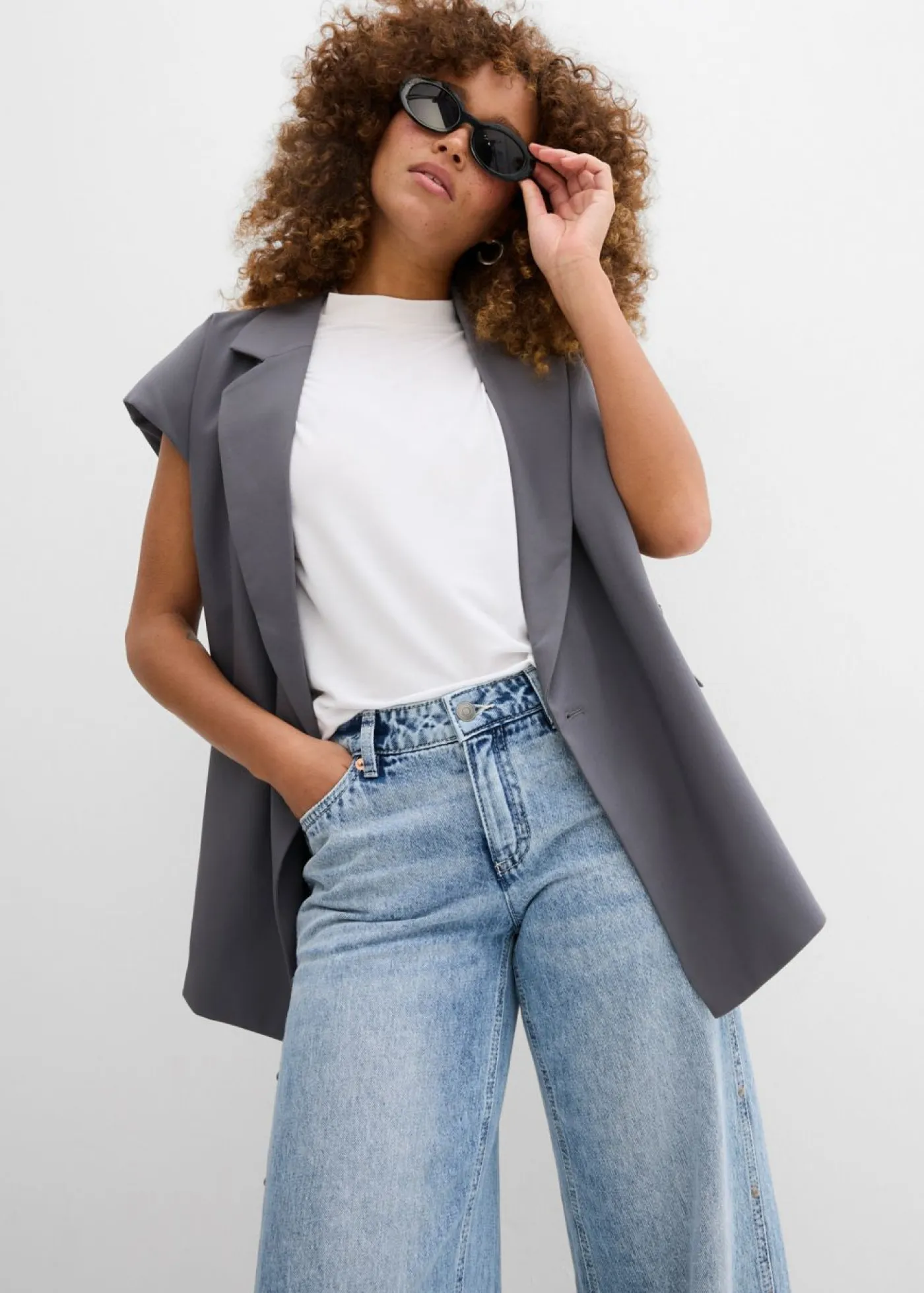 Mujer bonprix bonprix Vaqueros low stretch con corte holgado, talle medio y diseño recto